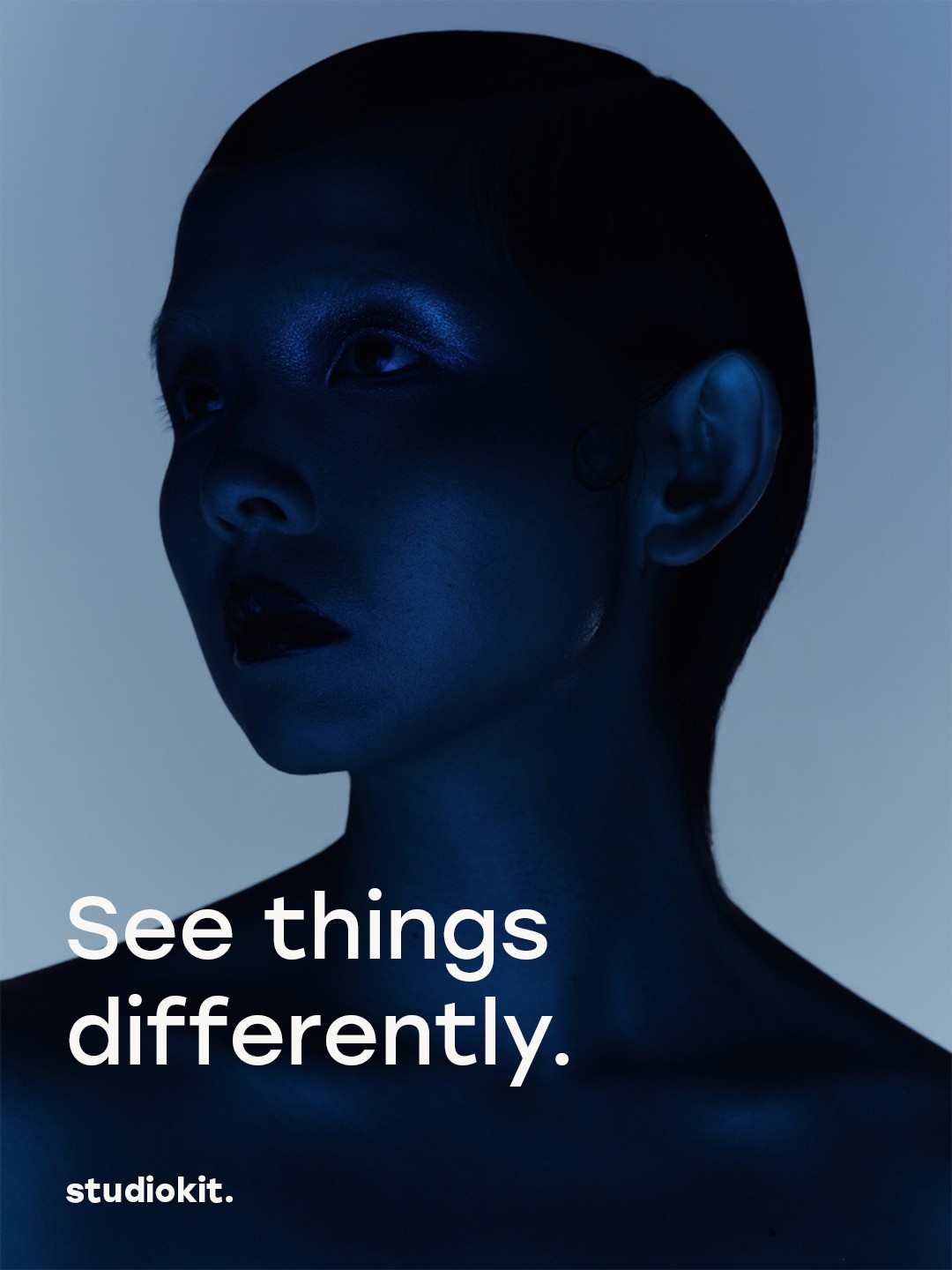 studiokit. campaign: blue-lit portrait. See things differently.